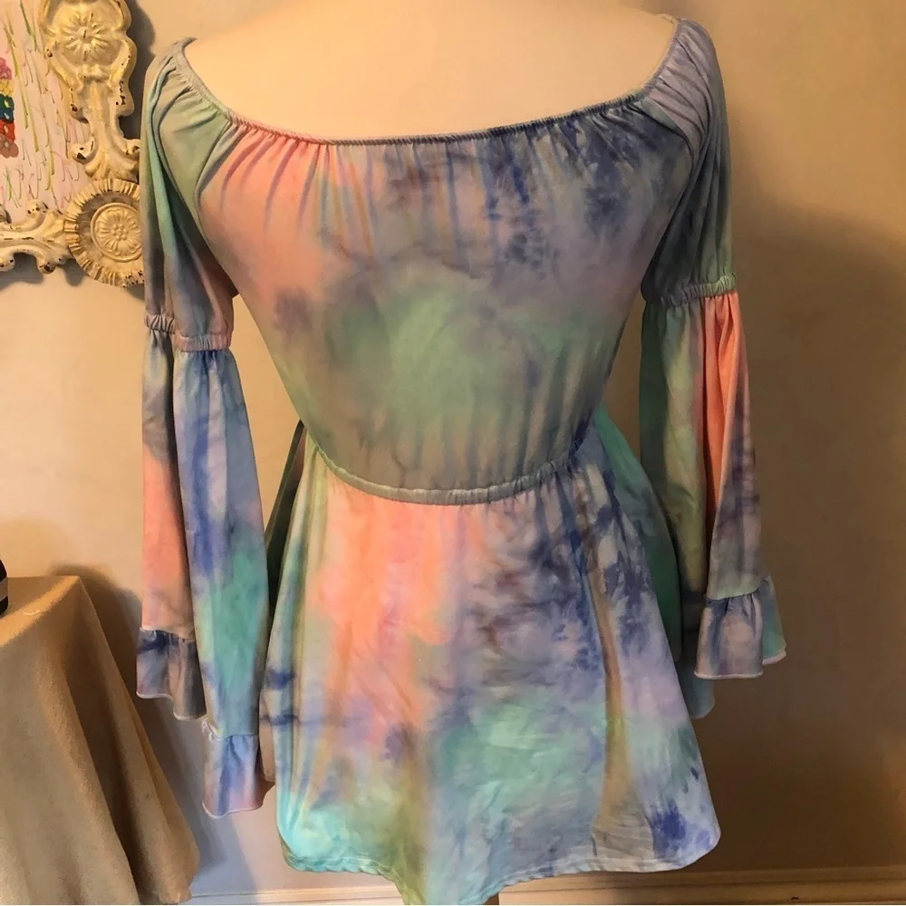 Girls tie dyed pink top w/elastic waist & upper arms w/ long ruffle bell sleeves